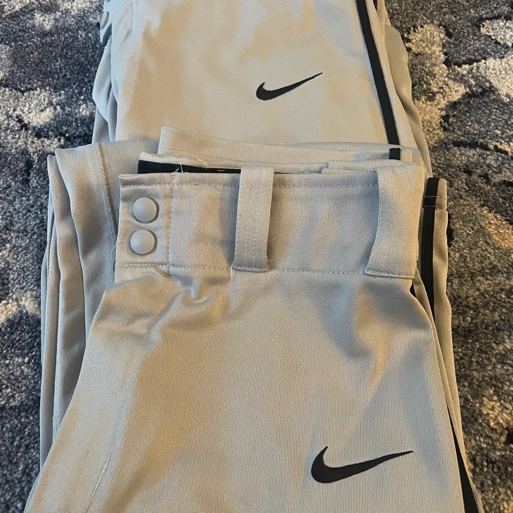 Nike baseball pants with black stripe